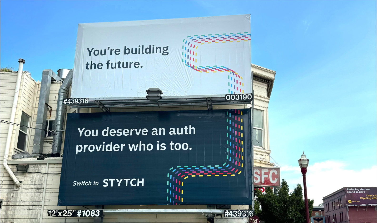 Billboard reading "You're building the future, you deserve an auth provider who is too."